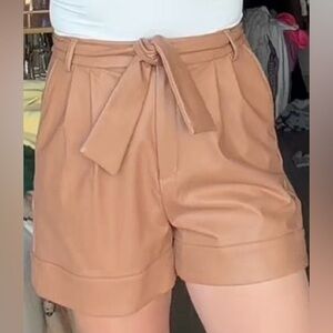 Tan High-Waisted Belted shorts